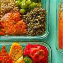 Vibrant, healthy meal prep containers symbolizing nutritional optimization.
